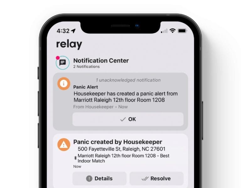 Smartphone screen showing an active panic alert with location and time details.