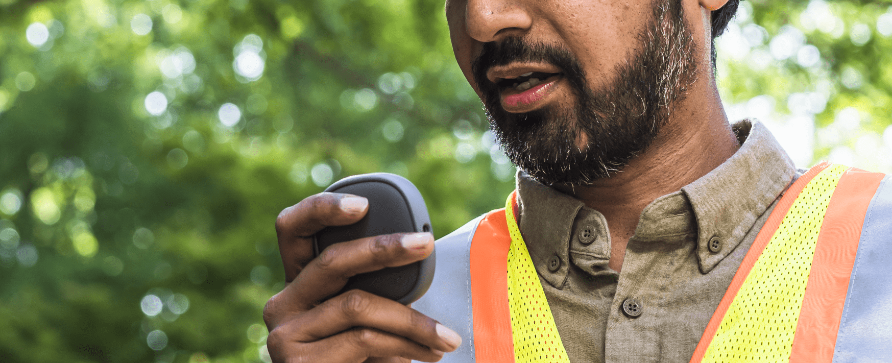 A construction employee using Relay to report an emergency.