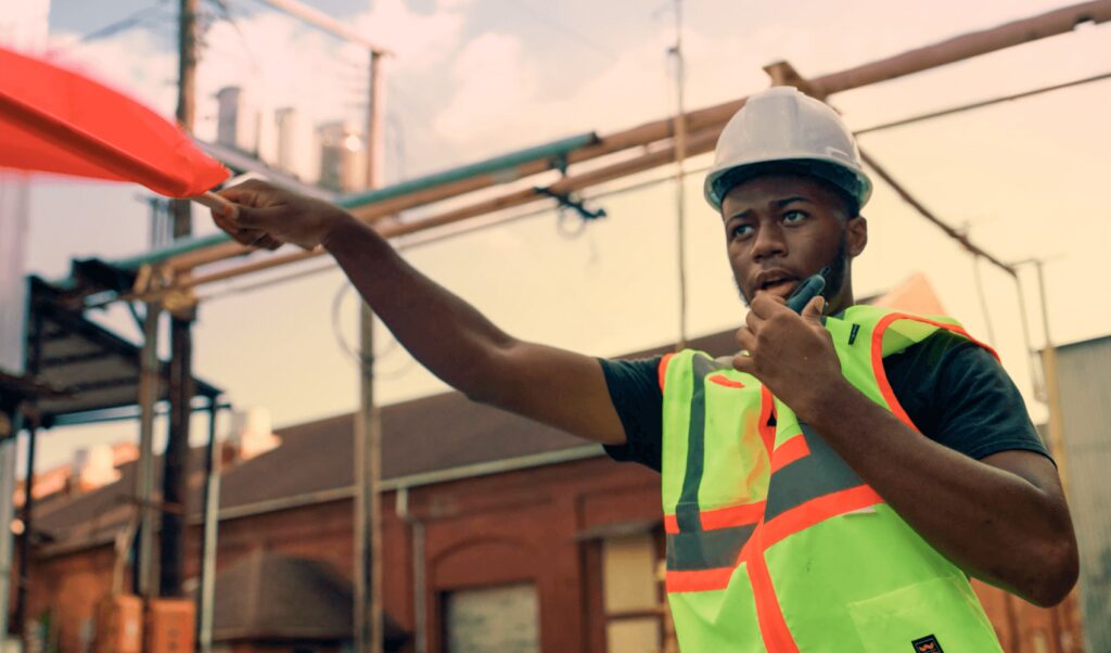 A manufacturing worker communicating with his team offsite via RelayX