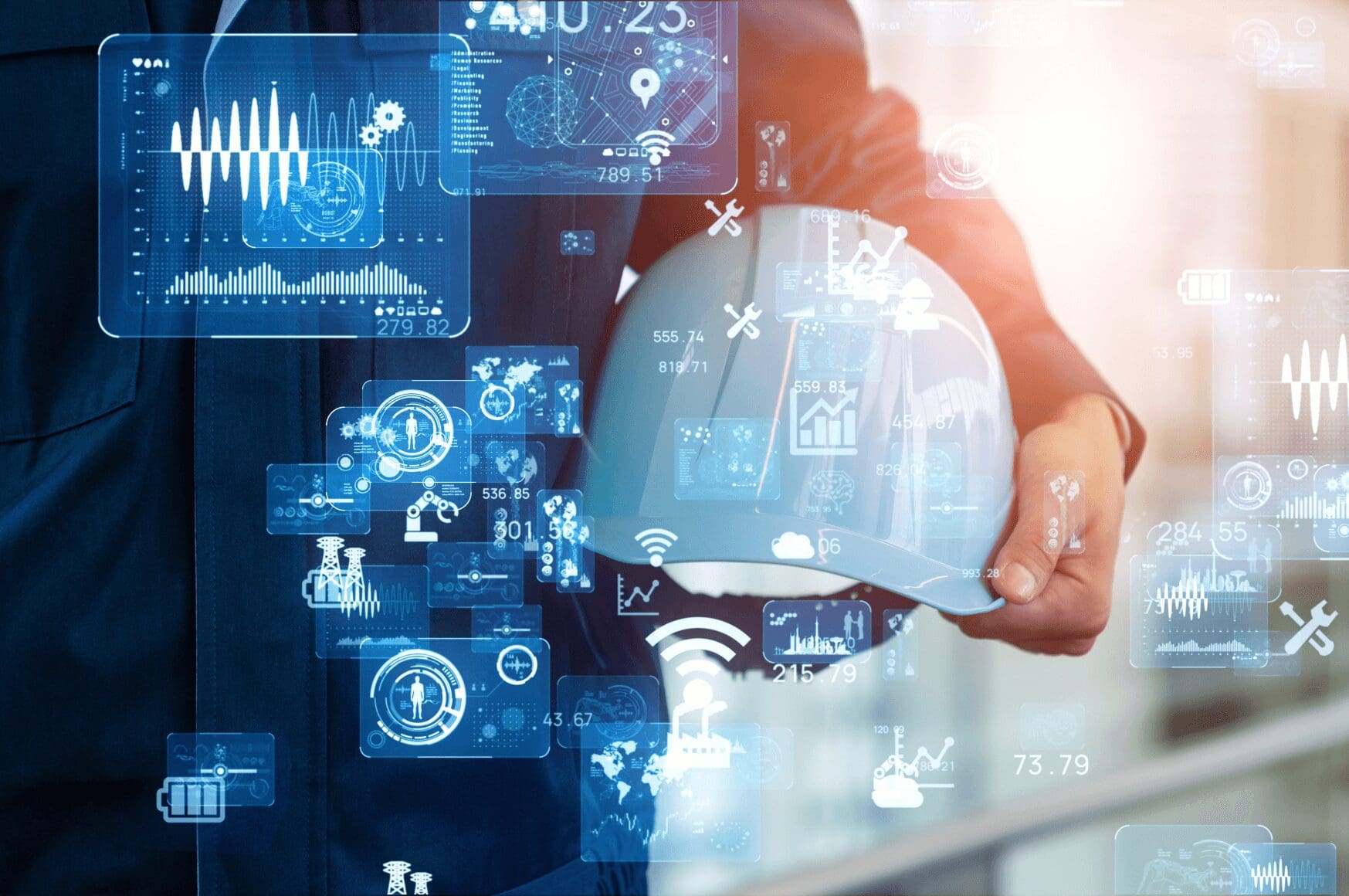 person holding hardhat surrounded by new technology