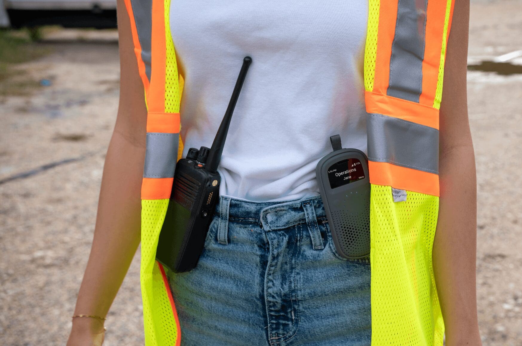 Traditional two-way radio with ctcss and RelayX on woman's belt