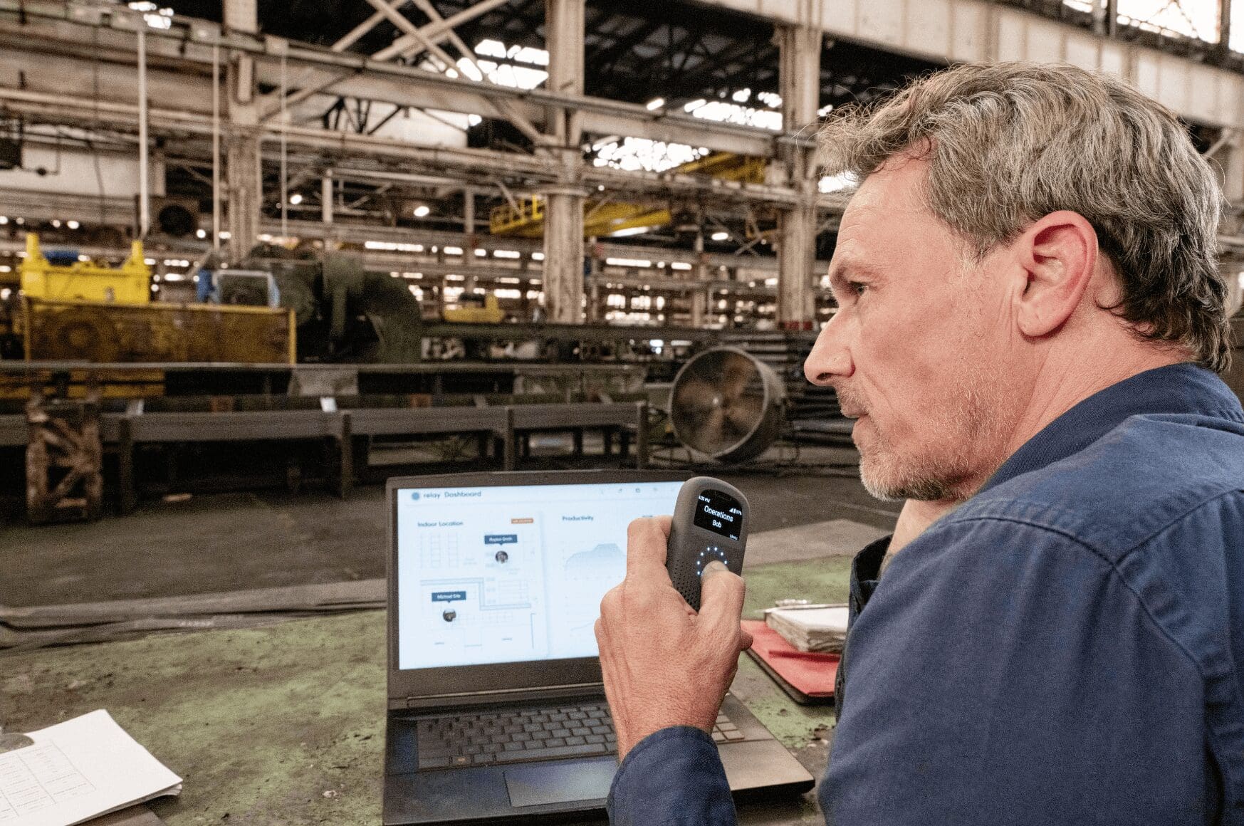 Industrial worker using Relay technology in a manufacturing space