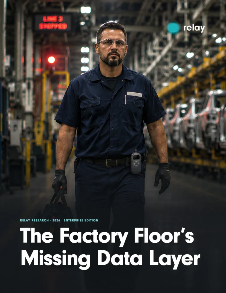 Cover photo of ebook The Factory Floor's Missing Data Layer with technician walking an auto manufacturing floor